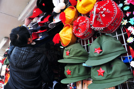 BEIJING - MARCH 11:Mao Zedong hats for sale at The Forbidden City on March 11 2009 in Beijing,China.Mao Zedong was the founding father of the People's Republic of China from its establishment in 1949.のeditorial素材