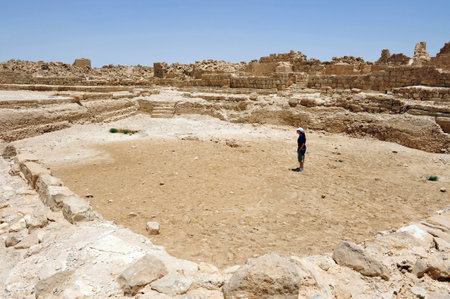 SHIVTA, ISR - MAY 31:Visitor at the ruins of the Byzantian city of Shivta on May 31 2009.Shivta was founded in Israel around 1 century BCE and housed a mixed population of Romans and Nabateans.のeditorial素材