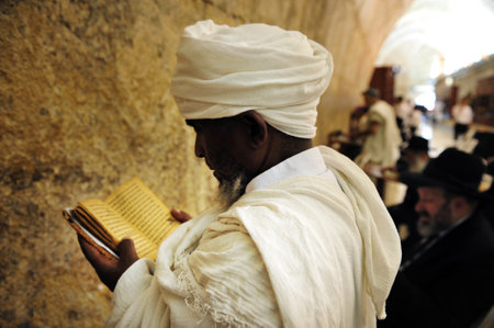 JERUSALEM - JULY 20:Jewish people pray in The Cave Synagogue at the Western wall on July 20 2009 in Jerusalem, Israel. Traditionally, it is regarded as the only remnant of the Jewish Temple.のeditorial素材