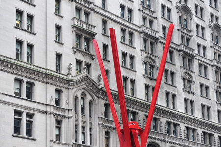 Red Steel Sculpture in lower Manhattan New York, USA.