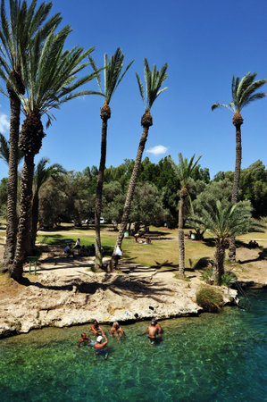 BEIT -SHEAN, ISRAEL - MAY 17:Visitors at Gan Hashlosha on May 17 2009 near Beit She'an, Israel.のeditorial素材