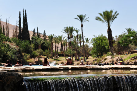 BEIT -SHEAN, ISRAEL - MAY 17:Visitors at Gan Hashlosha on May 17 2009 near Beit She'an, Israel.のeditorial素材
