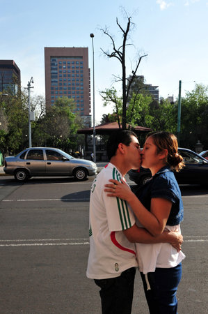MEXICO CITY - FEB 25: Mexican couple Kissing in public on February 25 2010 in Mexico City, Mexico.Some cultures and religions frown upon public displays of affection.のeditorial素材
