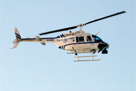 TEL AVIV - JAN 01:Israeli police helicopter on air patrol on Jan 01 2010.It commonly use for traffic control, ground support, search and rescue, public events and high-speed car pursuits.のeditorial素材