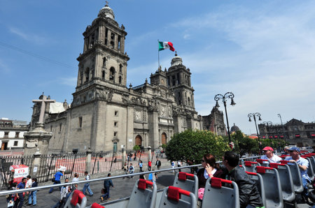 MEXICO CITY -  FEB 28 2010: The Metropolitan Cathedral at the Zocolo square in Mexico City, Mexico. It is the largest cathedral in the Americas and seat of the Roman Catholic Archdiocese of Mexicoのeditorial素材