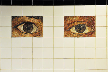 Artwork of human eyes on a tile wall.のeditorial素材