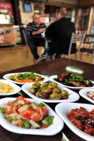 SDEROT - DECEMBER 29: Oriental salads in a restaurant on December 29 2009 in Sderot, Israel.のeditorial素材