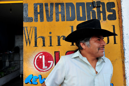 MEXICO CITY - FEB 28: Mexican man wearing a cowboy hat on February 28 2010 in Mexico City, Mexico.Mexican men still expect to provide, protect, and make most decisions for their families.のeditorial素材