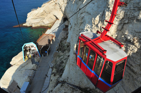 ROSH HANIKRA,ISR - JAN 12:Cable car to Rosh HaNikra on January 01 2011.It's a geologic formation of a white chalk cliff with spectacular grottos located on the north coast of Israel.のeditorial素材