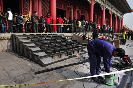BEIJING - MARCH 12:Chinese builders during renovation the Forbidden city on March 12 2009 in Beijing,China.This renovation will be completed 2020 to mark the 600th anniversary.のeditorial素材
