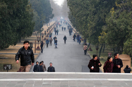 BEIJING-MARCH 15:Chinese people visit at the Temple of Heaven park on Mar 15 2009 in Beijing, China.In 1918 the temple was turned into a park and for the first time open to the publicのeditorial素材