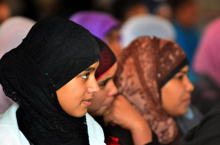 WESTERN NEGEV-DECEMBER 13:Bedouin arab women wear traditional head dress on December 13 2011.Negev Bedouin are formerly nomadic and later also semi-nomadic Arabs who live by rearing livestock in the deserts of southern Israel.のeditorial素材