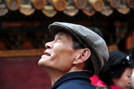 BEIJING - MARCH 11:Chinese man at the Forbidden City on March 11 2009 in Beijing,China. The average life expectancy among Chinese men is 72 yearsのeditorial素材