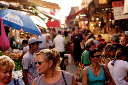 TEL AVIV - FEB 27:Shoppers at the Carmel Market on Feb 27 2007 in Tel Aviv, Israel.It's one of Israel's oldest and biggest outdoor marketplaces offers a wide variety of foods and merchandise.のeditorial素材