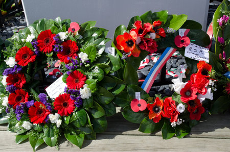 MANGONUI, NEW ZEALAND - APRIL 25 2012: Ceremonial wreaths during Anzac Day - War Memorial Service.のeditorial素材