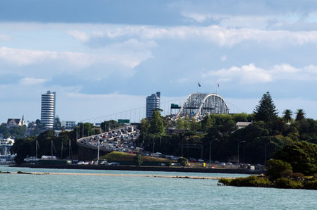 AUCKLAND - FEB 21:Havy traffic over Auckland Harbour Bridge on February 21 2013 in Auckland, New Zealand. It's the second-longest road bridge in New Zealand, and the longest in the North Island.のeditorial素材