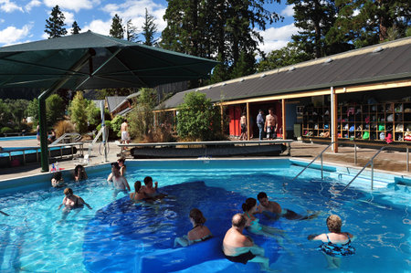 HANMER,NZ - MAR 15: Tourists enjoying hot pools in Hanmer springs on March 15 2009.Hanmer Springs is a very popular tourist destination in the south Island of NZ.のeditorial素材
