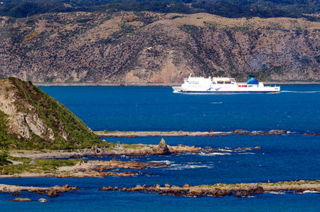 WELLINGTON - FEB 23:Interislander Cook Strait Ferry to Wellington, New Zealand on February 23 2013. The ferry carries passengers, vehicles and freight between Wellington and Picton daily.のeditorial素材