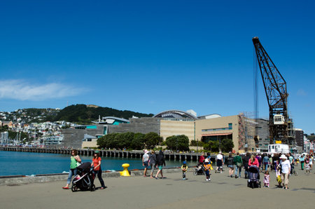 WELLINGTON - FEB 24: Visitors at Wellington Waterfront on February 24 2013. Wellington is the capital city and second most populous urban area of New Zealand as It is home to 395,600 residents.のeditorial素材