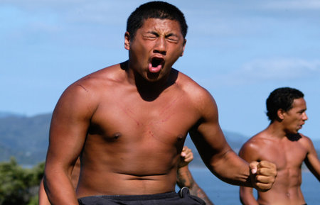 WAITANGI - FEB 6:Maori warriors perform Haka dance during Waitangi Day on February 6 2004 in Waitangi NZ.It's a New Zealand public holiday to celebrate the signing of the Treaty of Waitangi in 1840のeditorial素材