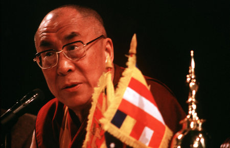AUCKLAND - APRIL 10 2003: His Holiness the 14th Dalai Lama of Tibet is giving a speech in Auckland  New Zealand in April 10 2003.He has lived in exile in India since the Chinese Army crushed an uprising in his homeland in 1959.のeditorial素材