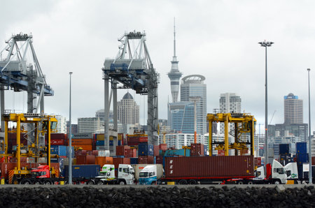 AUCKLAND,  NZL -OCT 13 2015:Big cargo ship unloading containers in Ports of Auckland New...