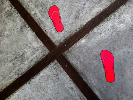 Pink Flip-flops marks on concrete floor. Abstract background textureの写真素材