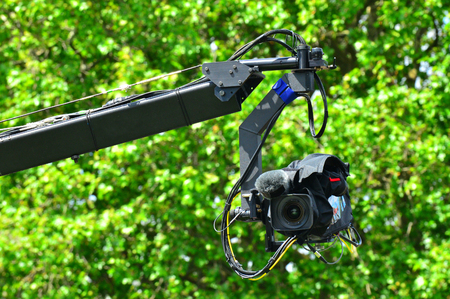 Professional video camera on JIb crane outdoors.の写真素材