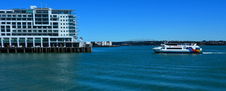 AUCKLAND,  NZL - NOV 05 2015:Fullers MV Quick Cat ferry sail near Princes Wharf. On December 12, 2013, Hilton again became a public company in its second IPO to raise an estimated 2.35 billion.のeditorial素材