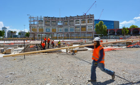 CHRISTCHURCH - DEC 07 2015:Builders builds a new building in Christchurch.Over 1000 buildings in the CBD (Central Business District) were demolished following Christchurch earthquakesのeditorial素材