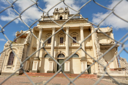CHRISTCHURCH - DEC 06 2015:Damaged building, Cathedral of the Blessed Sacrament,  in Christchurch.Over 1000 buildings in the CBD (Central Business District) were demolished following the earthquakes.のeditorial素材