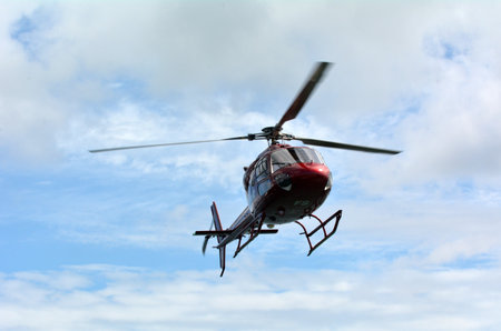 AUCKLAND - JAN 31 2016:Helicopter Hovering in the air.Hovering can be the most difficult skill when...