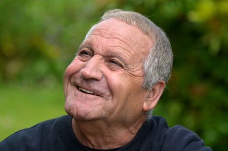 Portrait of happy mature man in his 70's.の写真素材