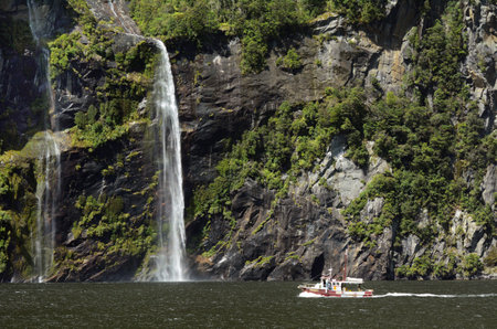 MILFORD SOUND,NZ - JAN 14:Fishing boat on Jan 14 2014.Southland has the largest rock lobster crayfish fishery in NZ, currently returning more than 30 million in annual exports, mostly to Hong Kong.のeditorial素材