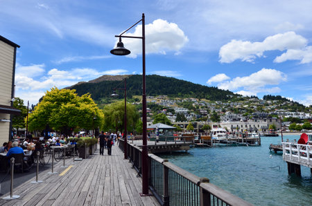 QUEENSTOWN, NZ - JAN 16 2014:Visitors in Queenstown on Jan 16 2014.It's one of the most popular travel destination in New Zealand known for it's restaurants, ski tourism and extreme sport adventure.のeditorial素材
