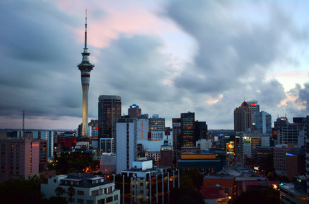 AUCKLAND - MAR 19 2016:Dramatic view of Auckland city skyline at dusk.Auckland is the  biggest city...
