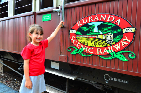 CAIRNS, AUS - APR 17 2016:Child (Talya Ben-Ari age 5-6) Passenger on Kuranda Scenic Railway a very popular tourist attraction in the tropical north of Queensland Australiaのeditorial素材