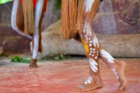 Yirrganydji Aboriginal men dance to Aboriginal music, during Aboriginal culture show in Queensland, Australia.の写真素材
