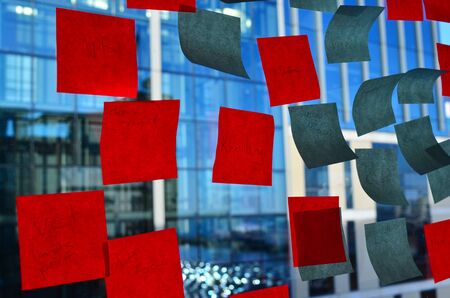 notes on office building window after brainstorming meeting.