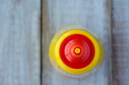 Flat lay of Mustard bottle. Food background and texture with copy spaceの写真素材