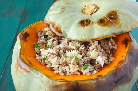 Overhead view of Stuffed pumpkin with rice and mince. Food background. copy spaceの写真素材