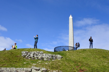 AUCKLAND - AUG 14 2016:Visitors in One Tree Hill in Cornwall Park in Auckland New Zealand. It's one of the oldest and most popular park in Auckland, New Zealand.のeditorial素材