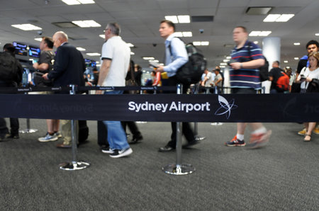 SYDNEY, Australia - OCT 24 2016: Passengers at Sydney Airport Sydney, Australia. It is the busiest...
