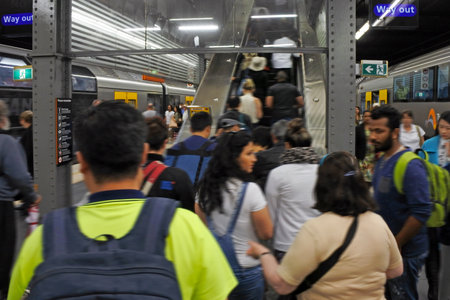 SYDNEY - OCT 20 2016: Passengers get off Sydney Trains at Town Hall railway station. Sydney Trains is the suburban passenger rail network serving the city of Sydney, New South Wales, Australia.のeditorial素材