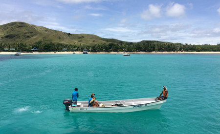 NADI, FIJI - DEC 12 2016:Tourists arrive to a resort on one of the Mamanucas islands. The volcanic archipelago is a very popular tourist destination, lying West to Viti levu the main Island of Fijiのeditorial素材