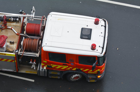 Auckland, New Zealand - May 12 2017:Aerial view of a fire engine truck, a vehicle designed primarily for firefighting operations. Modern vehicle will carry tools for a wide range of firefighting and rescue tasks.のeditorial素材