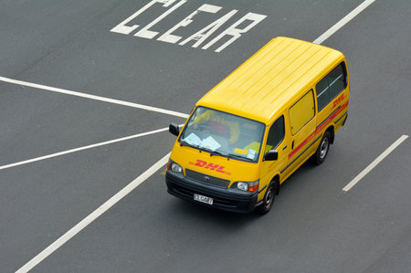 Auckland, New Zealand - May 19 2017:Aerial view of DHL Express vehicle, a German logistics company providing international courier, parcel and express mail services.のeditorial素材