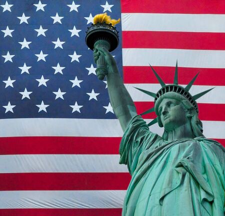 The Statue of liberty over the flag of the United States of America. American Collage backgroundの写真素材