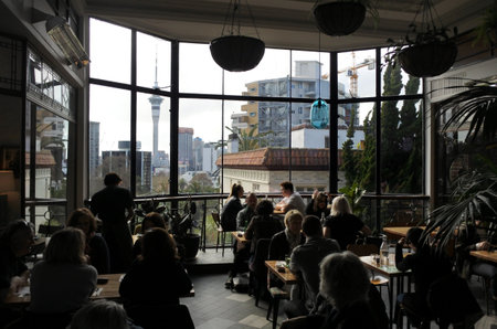 AUCKLAND - AUG 11 2017:People dining in St Kevins Arcade. It's a very popular tourist attraction known for it restaurants, cafe and shops in Karangahape (K) Road Auckland, New Zealand.のeditorial素材