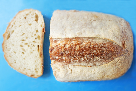 Sliced bread loaf falt lay view. Food background and texture. Copy space